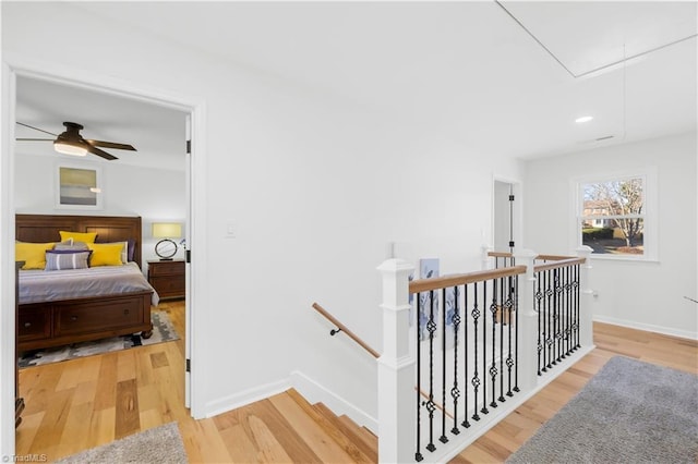 corridor featuring hardwood / wood-style floors