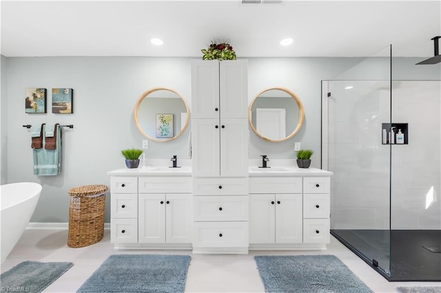 bathroom with plus walk in shower and vanity