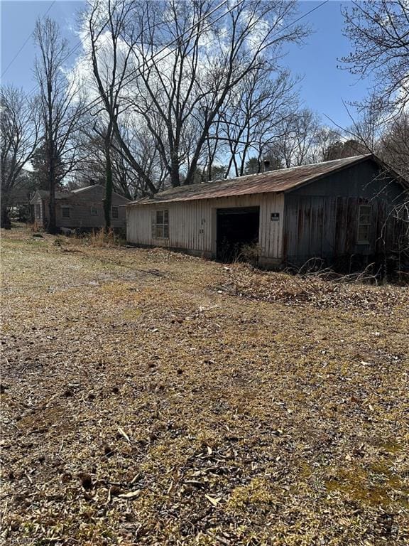 view of outbuilding featuring a garage