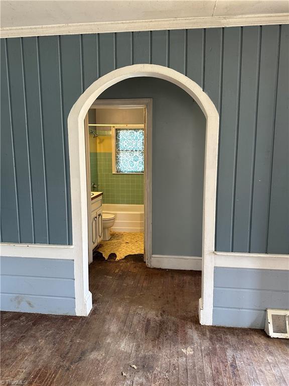 entrance to property featuring board and batten siding