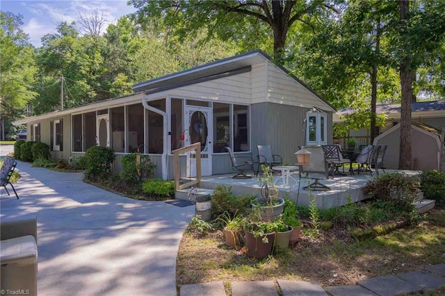 196 Watson Ln, Lexington, NC 27292 - view of front of property featuring a sunroom and a patio area