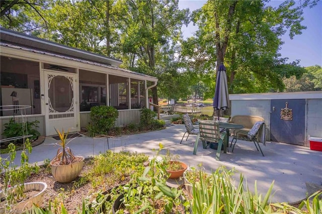 196 Watson Ln, Lexington, NC 27292 - view of patio / terrace with a sunroom and outdoor dining area