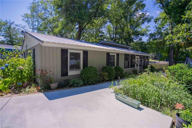 196 Watson Ln, Lexington, NC 27292 - view of front of property with a metal roof, a patio, and board and batten siding