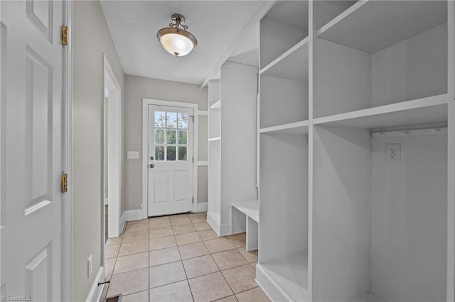 mudroom with light tile patterned floors