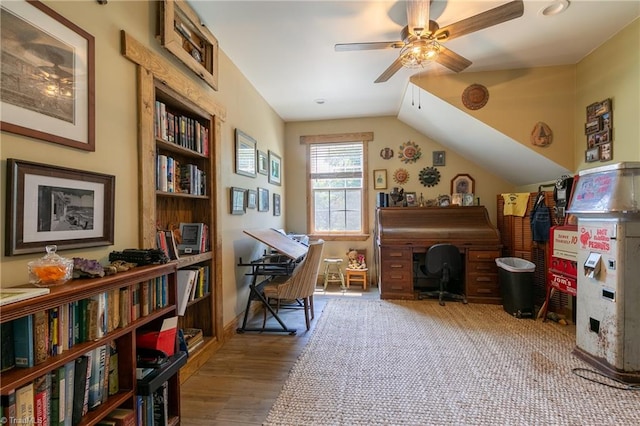 interior space with ceiling fan, lofted ceiling, and light hardwood / wood-style floors