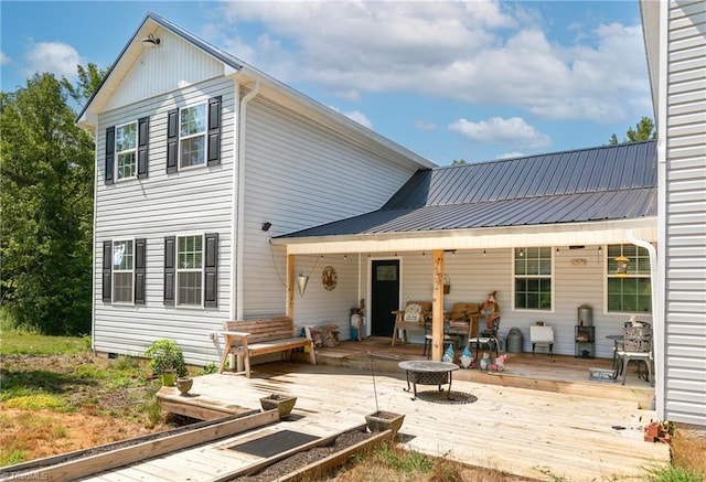 rear view of house with a deck