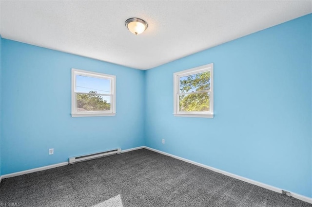 1115 Wachovia St, Winston-Salem, NC 27101 - carpeted empty room with a baseboard heating unit and baseboards