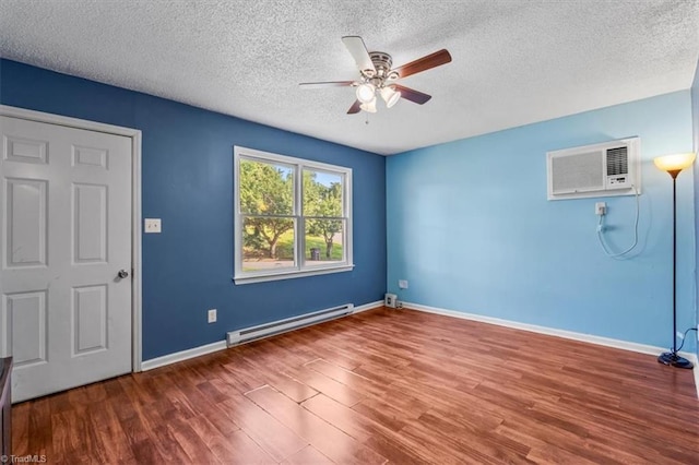 1115 Wachovia St, Winston-Salem, NC 27101 - spare room featuring a baseboard radiator, ceiling fan, wood finished floors, a textured ceiling, and a wall mounted AC