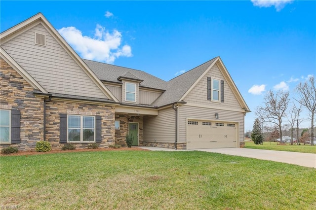 7028 Westfield Village Cir, Summerfield, NC 27358 - craftsman-style house with stone siding, an attached garage, concrete driveway, a front yard, and roof with shingles