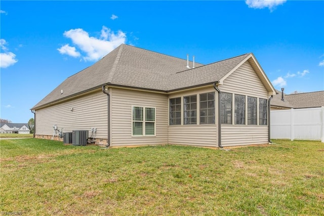 7028 Westfield Village Cir, Summerfield, NC 27358 - rear view of property with roof with shingles and a sunroom