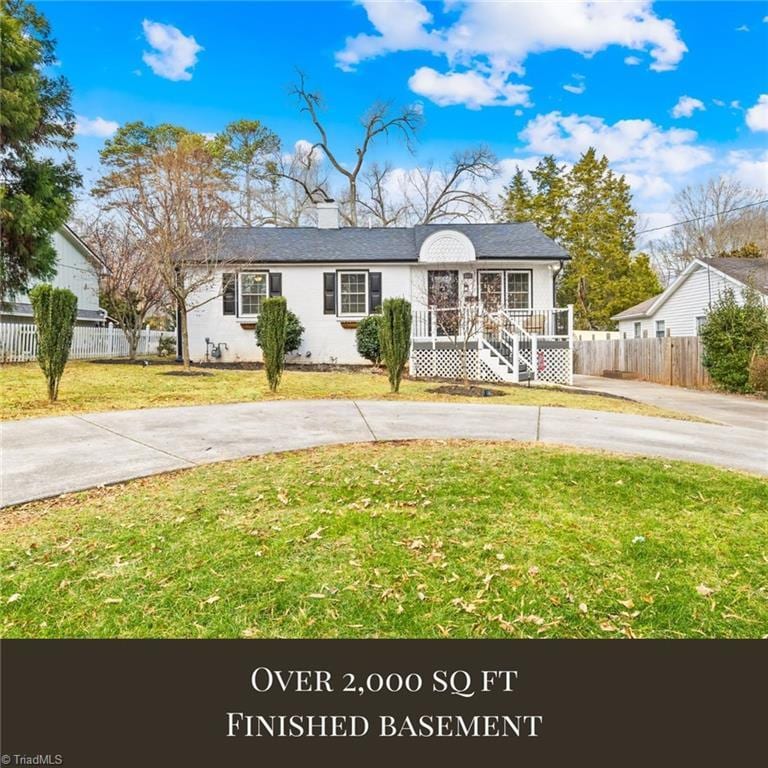 view of front of property with a front lawn