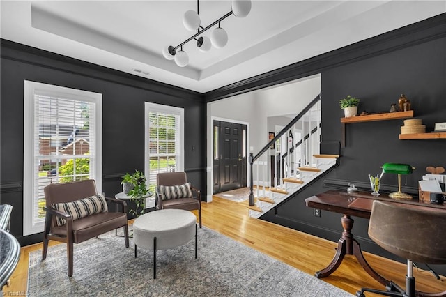 217 Oakmont Park Ct, Kernersville, NC 27284 - home office with a raised ceiling, wood finished floors, and ornamental molding