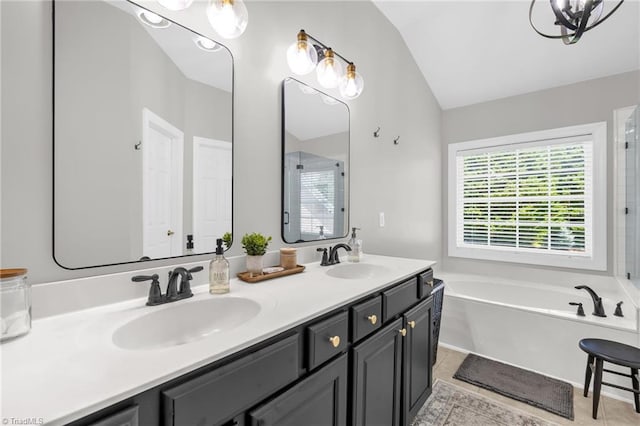 217 Oakmont Park Ct, Kernersville, NC 27284 - bathroom featuring vaulted ceiling, a garden tub, double vanity, tile patterned floors, and a shower with door