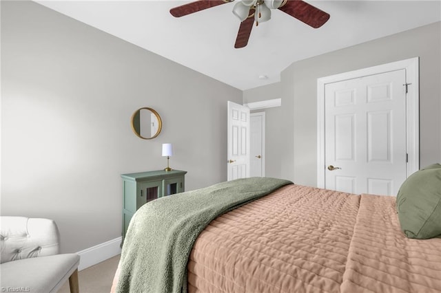 217 Oakmont Park Ct, Kernersville, NC 27284 - carpeted bedroom with baseboards and a ceiling fan
