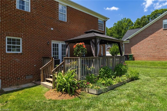 217 Oakmont Park Ct, Kernersville, NC 27284 - back of house with a gazebo, crawl space, a yard, and brick siding