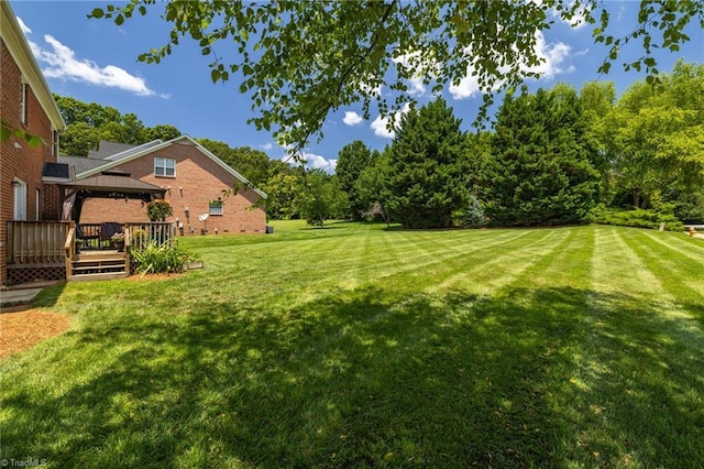 217 Oakmont Park Ct, Kernersville, NC 27284 - view of grassy yard with a gazebo and a deck