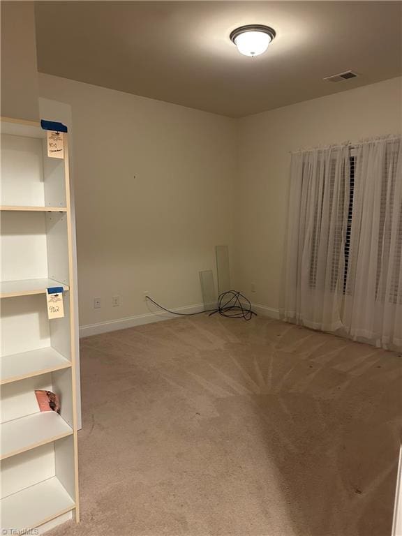 empty room featuring carpet