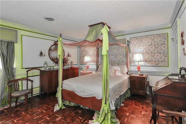 bedroom featuring visible vents and crown molding