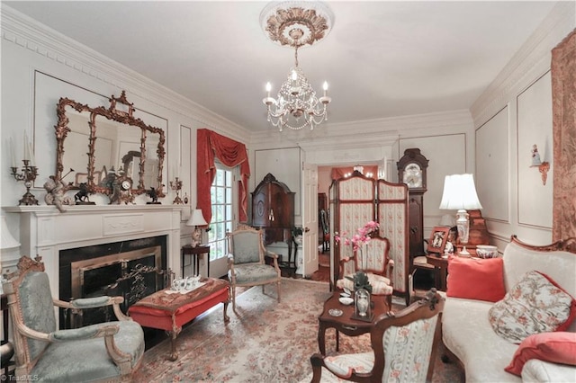 living room featuring crown molding and a chandelier