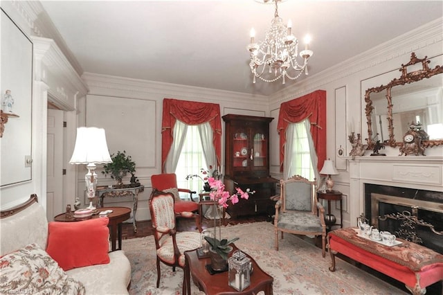 living room with plenty of natural light, a chandelier, crown molding, and wood-type flooring