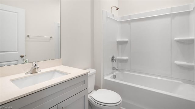 full bathroom with vanity, toilet, and shower / bath combination