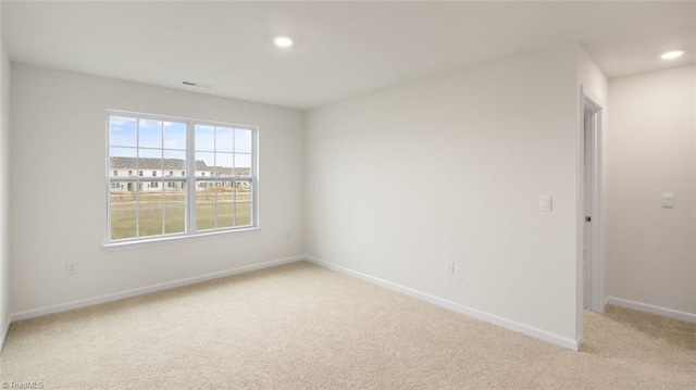 319 Willowbrooke Way, Stokesdale, NC 27357 - spare room with light colored carpet, baseboards, and recessed lighting
