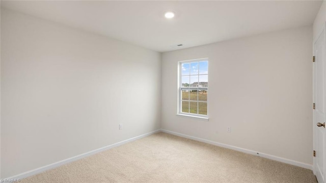 spare room with carpet flooring