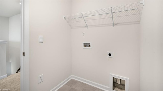 laundry area featuring hookup for a washing machine, carpet floors, and hookup for an electric dryer