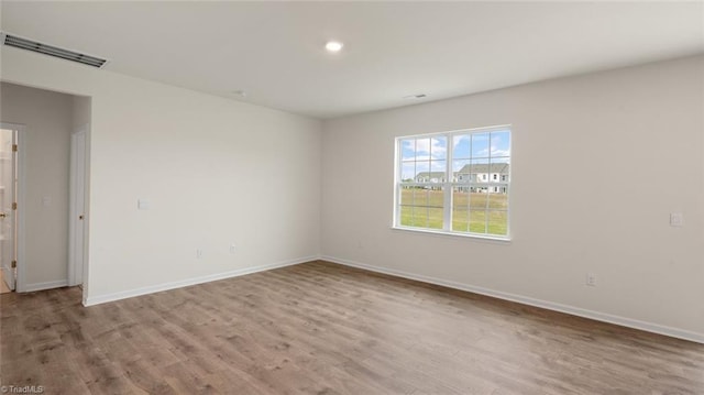 319 Willowbrooke Way, Stokesdale, NC 27357 - empty room with wood finished floors and baseboards