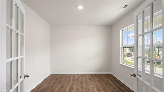 319 Willowbrooke Way, Stokesdale, NC 27357 - empty room with french doors, dark wood-style floors, baseboards, and recessed lighting
