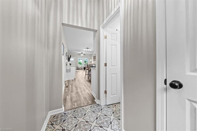 7517 NC Highway 62, Trinity, NC 27370 - hallway featuring baseboards and light tile patterned floors