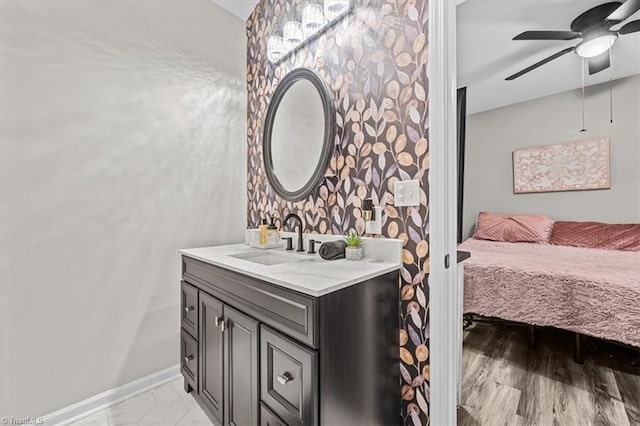 7517 NC Highway 62, Trinity, NC 27370 - bathroom with vanity, ceiling fan, and ensuite bath