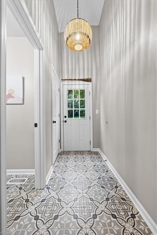 7517 NC Highway 62, Trinity, NC 27370 - doorway with baseboards and a high ceiling
