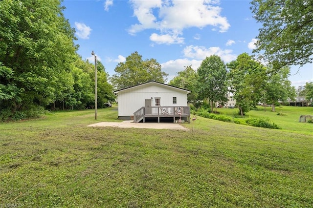 7517 NC Highway 62, Trinity, NC 27370 - rear view of property with a deck and a lawn