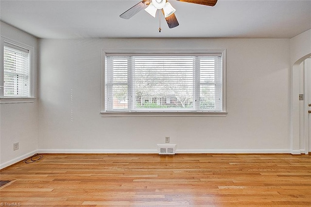 spare room with light hardwood / wood-style floors and ceiling fan