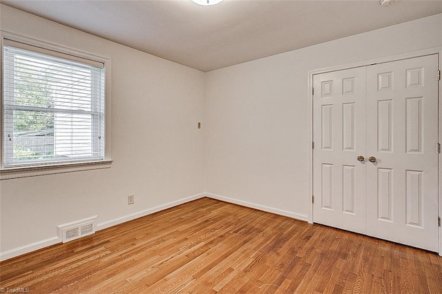 empty room featuring light hardwood / wood-style floors