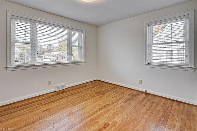 empty room with light wood-type flooring