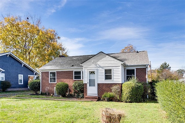 view of front of home with a front yard