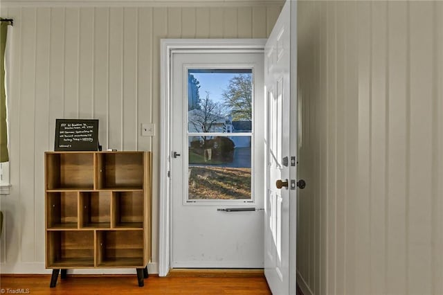 entryway with hardwood / wood-style flooring