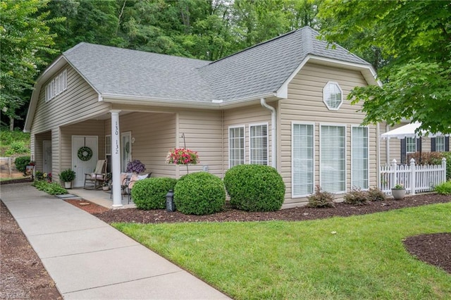 130 W Brick Walk Ct, Mocksville, NC 27028 - view of front facade featuring a shingled roof and covered porch