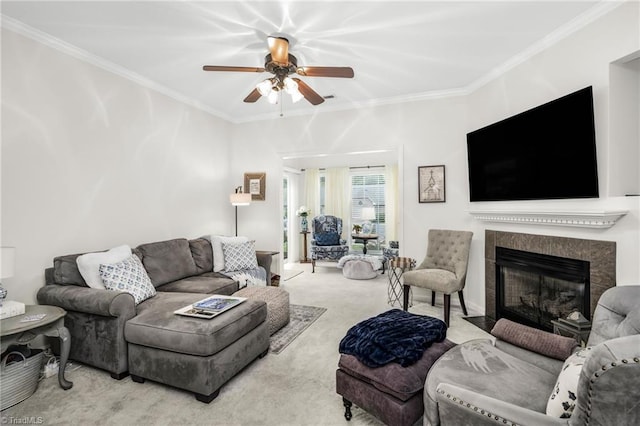 130 W Brick Walk Ct, Mocksville, NC 27028 - carpeted living room with ceiling fan, crown molding, and a fireplace with flush hearth