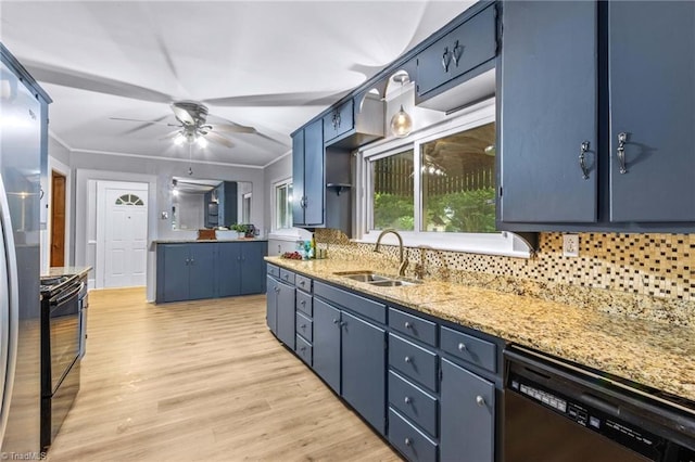 kitchen with black range with electric stovetop, dishwasher, sink, and blue cabinetry