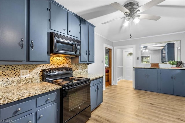 kitchen with blue cabinets, light hardwood / wood-style flooring, crown molding, and black appliances