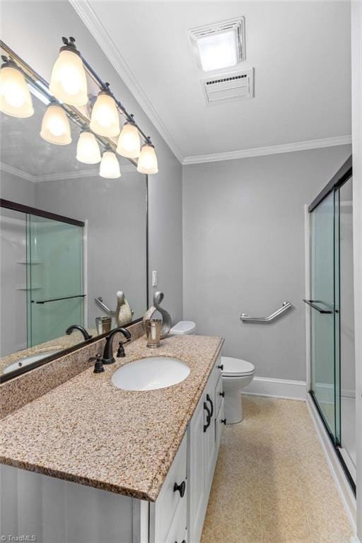 bathroom with walk in shower, vanity, crown molding, and toilet