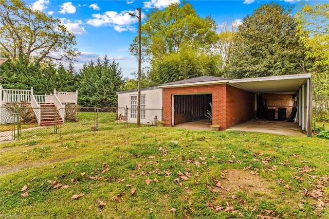 view of yard with a carport