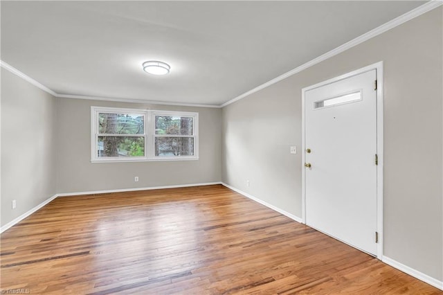 2508 Netherwood Dr, Greensboro, NC 27408 - spare room with ornamental molding and wood finished floors