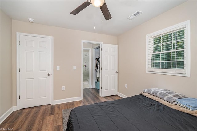 bedroom featuring ceiling fan and dark hardwood / wood-style flooring