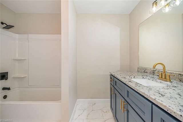 bathroom featuring vanity and shower / tub combination