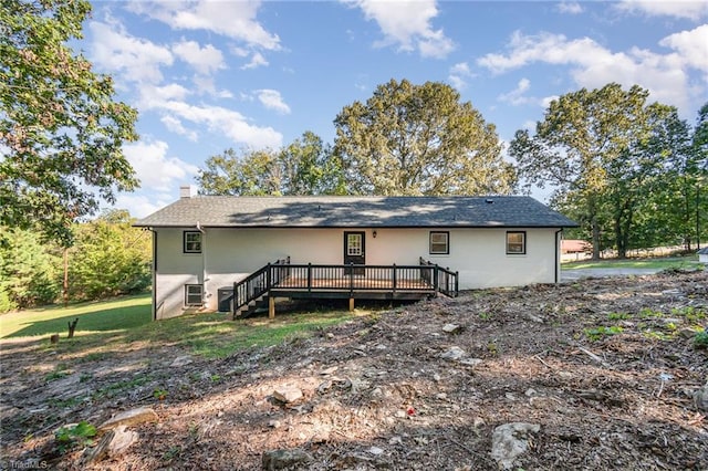 rear view of property with a deck