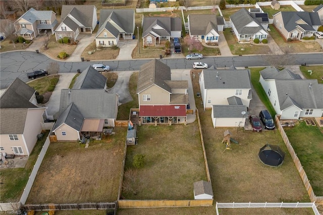 birds eye view of property with a residential view